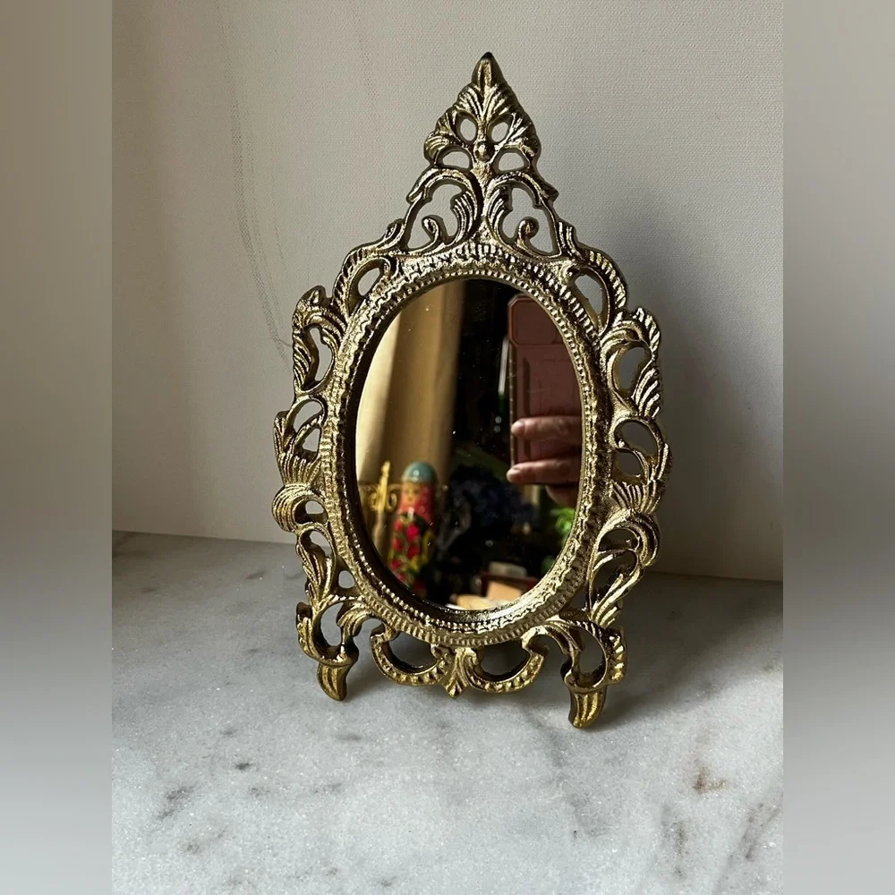 Ornate Vanity Mirror Oval metal Frame Scrollwork Tabletop Stand..